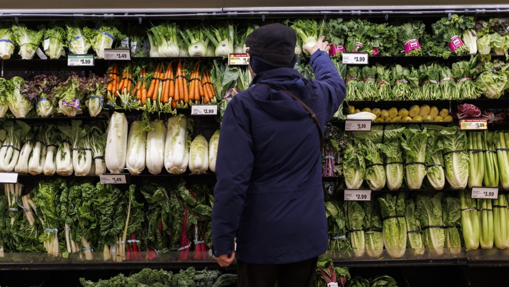 Almost two-thirds of Canadians say they have switched their primary grocery store in the past year to score better deals. A customer shops for produce at a grocery store In Toronto on Friday, Feb. 2, 2024. THE CANADIAN PRESS/Cole Burston