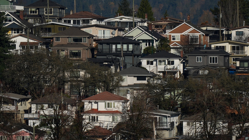 Houses are seen on a hill in Vancouver, on Thursday, November 23, 2023. THE CANADIAN PRESS/Darryl Dyck