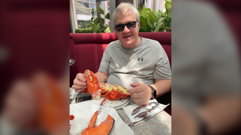 Agriculture Minister Lawrence MacAulay is pictured eating lobster in Malaysia during an official trip. (Source/Lawrence MacAulay/X)