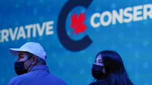 Conservative supporters watch at Conservative leader Erin O'Toole's election headquarters as its been declared a Liberal government win during the Canadian federal election in Oshawa, Ont., on Monday, September 20, 2021. THE CANADIAN PRESS/Nathan Denette