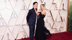 Timothee Chalamet, left, and Margot Robbie arrive at the Oscars on Sunday, Feb. 9, 2020, at the Dolby Theatre in Los Angeles. (Photo by Jordan Strauss/Invision/AP)