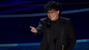 Bong Joon Ho accepts the award for best director for "Parasite" at the Oscars on Sunday, Feb. 9, 2020, at the Dolby Theatre in Los Angeles. (AP Photo/Chris Pizzello)