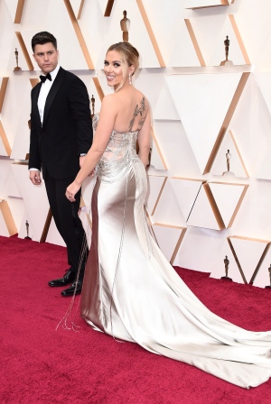 Colin Jost, left, and Scarlett Johansson arrive at the Oscars on Sunday, Feb. 9, 2020, at the Dolby Theatre in Los Angeles. (Photo by Jordan Strauss/Invision/AP) <br> <br> <b>Gallery sponsored by Wonder Bread</b>