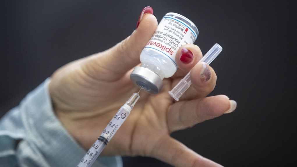 A person draws out Moderna vaccine at St. Lawrence College in Kingston, Ont., on Sunday Jan. 2, 2022. (THE CANADIAN PRESS/Lars Hagberg)