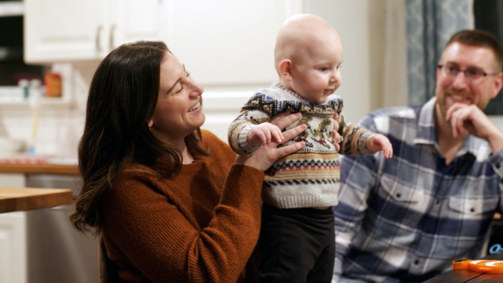 Rachael Gambino, Garrett Mazzeo and nine-month-old Miles are pictured at their home in Lansdale, Pennsylvania. (Deborah Brunswick, John General, CNN)